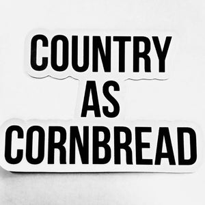 White sticker with the words Country As Cornbread.